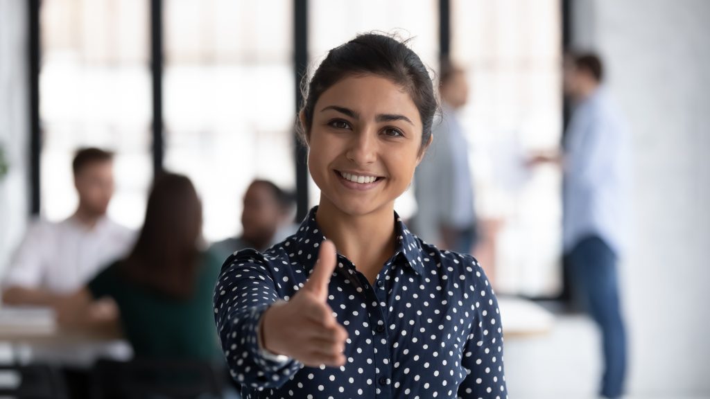 first impression of Friendly indian boss greeting client stretch out hand for handshake