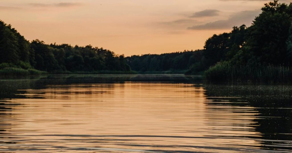 Calm river at sunset with gentle ripples, symbolizing relaxation and mental clarity