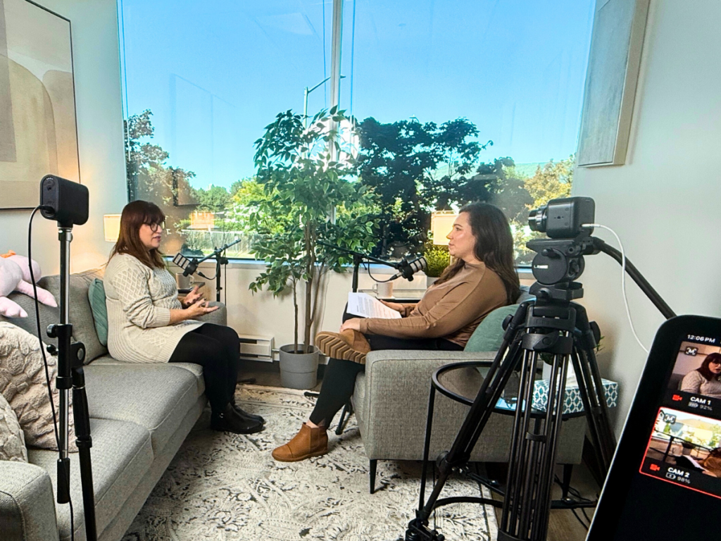 Elena Kourounis and Tina Wilston recording Episode 19 of The MindSpa Podcast in Ottawa, discussing how art therapy helps people heal and reconnect.
